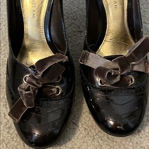 Brown patent leather pumps